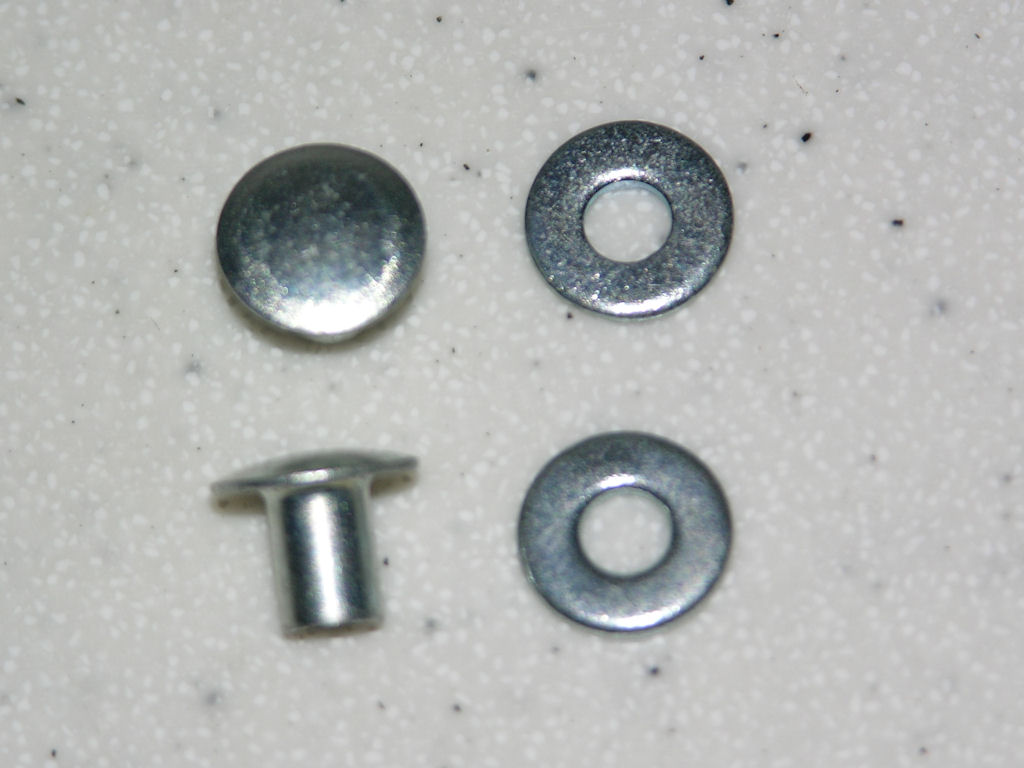 large picture of the TCS rivets and washers on a 1970 Nova